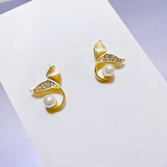 🔆 Product Whale Tail Earrings with 925 silver studs 🔆Size & Measurement Height: 2 cm, 0.79" Width: 1.5 cm, 0.59" 🔆 Free shipping within Canada - All jewelry comes in a beautiful and careful packaging 🔆Jewelry Care - Remove before swimming, showering, exercising, or going in a hot tub - Avoid perfumes, lotion, or sunscreen when wearing - Store in a cool dry place Happy to answer any questions! Dolphin Tail, Light Jewelry, Mermaid Earrings, Whale Tail, Gold Jewellery Design, Metal Earrings, Gold Plated Earrings, Jewelry Packaging, Silver Studs