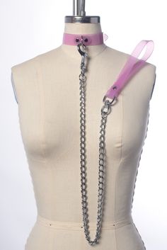 Minimal choker collar made in dreamy pastel PVC material. Features a d-ring in center front. Fit is adjustable with buckle in back. The leash clips on to the d-ring. The heavy-duty chain is 30" long, total length including the handle is 36" long. Collar is 1" wide. Silver toned hardware. Available in pastel blush pink or lavender translucent PVC. SMALL/MEDIUM (11-13")MEDIUM/LARGE (13-15")LARGE/X-LARGE (15-17") Custom sizing available. All pieces are MADE TO ORDER, standard sizes S/M-L/XL. If you Pink Chains, Minimal Choker, Pastel Accessories, Purple Collar, Choker Collar, Pastel Goth, Pvc Material, Make Time, D Ring