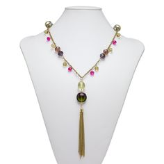 Versatile and artistic Everyday Jewelry necklace brings eye-catching flair to your wardrobe or fashion displays. This gold-finished necklace features faceted glass in a variety of colors. Colors, shapes and sizes may vary in each lot. Elegant Multicolor Adjustable Chain Necklace, Metal Tassel Necklace With Adjustable Chain As Gift, Multicolor Brass Elegant Necklaces, Trendy Gold Beaded Necklaces With Lobster Clasp, Trendy Gold Beaded Necklace With Lobster Clasp, Elegant Multicolor Brass Necklaces, Party Dangle Chain Necklace With Lobster Clasp, Metal Long Dangle Necklace With Chain, Multicolor Glass Necklace With Chain