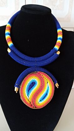 African Necklace, African Jewelry, African Beaded Necklace, Zulu Beaded Necklace, Dark Blue Necklace, Pendant Necklace, Gift For HerThis stunning pendant necklace is superbly crafted which makes you stands out in any occasion.Main Color - Dark Blue or Royal Blue.Different colors of your choice can be available.Wholesale available at a fair price.For any query please send me a convo or an e-mail.Happy Shopping!!! Unique Blue Beaded Necklaces, Unique Blue Beaded Chain Necklace, Unique Blue Beaded Necklace, Traditional Blue Beaded Necklace With Gold Beads, Blue Beaded Necklaces With Spacer Beads, Blue Beaded Necklaces With Colorful Beads, Blue Round Beaded Necklaces With Colorful Beads, Blue Necklace With Gold Round Beads, Blue Necklaces With Gold Round Beads