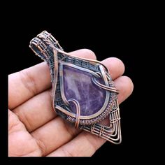 Welcome to our little shop, where you can find handmade copper wire jewelry and more, for you and your loved ones. We do accept custom orders also, kindly message us for more. Purple Amethyst Wire Wrapped Pendant Handmade Pendant Amethyst Pendant Gemstone Copper Wire Wrapped Jewellery Gemstone Pendant Gift For Her Main Stone - Amethyst Metal - Copper Pendant Length - 8.75 CM Pendant Width -  4.75 CM * Protection:- Copper will be tarnished after a while so try to limit contact with lotions, soaps Purple Wire Wrapped Metal Jewelry, Unique Amethyst Nickel-free Jewelry, Nickel-free Amethyst Jewelry, Wire Wrapped Purple Jewelry Gift, Artisan Purple Wire Wrapped Jewelry, Nickel-free Copper Wire Jewelry For Crafting, Teardrop Copper Wire Jewelry For Gifts, Artisan Amethyst Wire Wrapped Jewelry, Handmade Amethyst Bohemian Jewelry