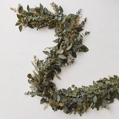 the letter s is made out of leaves and twigs