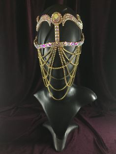 "Women 's face mask with gold chain \"Camilla\". Professional handmade by designer with love for you! Such bright accessories are perfectly matched with a bikini, dress, costume or other women's clothing. Perfectly combined with hairbands, earrings, necklaces and other jewelry with crystals. Also, this cute decoration looks good over a fabric mask of any color: black, white, pink, blue, red, green, etc. This accessory is often used for beach, night and dance parties, bellydance and ballroom fest Gold Jewelry For Costume Party, Gold Crown Headpieces For Festival, Gold Teardrop Crown Headpiece For Festival, Gold Crown Headpiece With Rhinestones, Glamorous Gold Body Jewelry With Rhinestones, Gold Beaded Body Jewelry For Parties, Gold Rhinestone Body Jewelry For Party, Gold Teardrop Crown Headpiece For Costume Party, Adjustable Gold Body Jewelry With Rhinestones