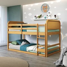 there is a bunk bed in the room with two sets of beds on top of it