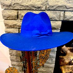 Blue Hat One Size Classic Blue Winter Hat, Casual Blue Hats For Rodeo, Blue Wide Brim Fedora For Kentucky Derby, Blue Fedora Felt Hat For Beach, Blue Fedora Felt Hat For Winter, Blue Winter Fedora Felt Hat, Casual Blue Felt Hat With Short Brim, Blue Wide Brim Hat Bands For Kentucky Derby, Adjustable Blue Fedora For Spring