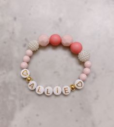 "This is a unique and cute custom bracelet for any little girls! The personalized name could be the first spelling lesson for your little girl to write her own name! All orders come with 1 personalized name bracelet and there are 3 different beaded options to choose from. 📬 If you want your order to deliver by Christmas, please select \"Priority Shipping\"! All options use golden letter, heart beads, and spacer beads. Option 1: Rainbow rhinestone beads mixed with white faceted beads, yellow mat Fun Bracelet, Custom Bracelet, Name Bracelet, Rhinestone Bead, Custom Bracelets, Star Girl, Heart Beads, Beads Bracelet, Faceted Bead