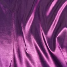 a close up view of a purple fabric