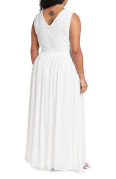 A flowy skirt and pleated bodice add graceful charm to this sleeveless maxi dress with an alluring V-neck. 60'' length (size 2X) Hidden back-zip closure V-neck Sleeveless Lined 100% polyester Machine wash Imported Model stats: 5'10" height, 41" bust, 36" waist, 48" hip. Model is wearing size 2X. Elegant Flowy Maxi Sleeveless Dress, Elegant Flowy Sleeveless Maxi Dress, Sleeveless Maxi Dress With Pleated Waist For Formal Events, Sleeveless Maxi Dress With Pleated Waist For Formal Occasions, Formal Sleeveless Maxi Dress With Pleated Waist, Spring Wedding Maxi Dress With Pleated Waist, Flowy V-neck Maxi Dress With Pleated Bodice, Chiffon A-line Maxi Dress With Pleated Bodice, White Maxi Dress With Pleated Back