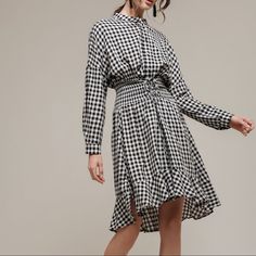 Notched Collar Dress With Frills, In Black And White Gingham. 100% Viscose. Brand New With Tags Spring Plaid Midi Dress Knee-length, Summer Plaid Long Sleeve Dress For Daywear, Summer Long Sleeve Plaid Dress For Daywear, Casual Gingham Midi Dress With Ruffles, Plaid Ruffled Midi Length Dress, Plaid Ruffled Midi Dress, Plaid Midi Dress With Ruffles, Chic Plaid Dress With Ruffles For Spring, Midi-length Plaid Dress With Ruffles