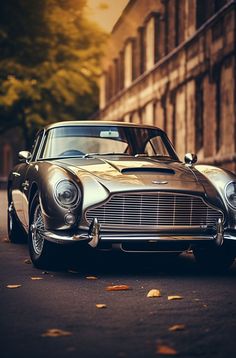 an old car is parked on the street