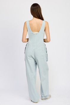 Elevate your casual wardrobe with our Oversized Cargo Overall, expertly crafted from 100% cotton for maximum comfort and durability. This piece redefines utility chic with its generous, relaxed fit that allows for easy movement and layering. The design features multiple functional pockets, perfect for carrying essentials while maintaining a stylish edge. Its versatile nature makes it suitable for various occasions, from laid-back weekends to more adventurous outings. Whether paired with a simple Utility Cotton Overalls With Pockets, Relaxed Fit Cotton Overalls, Utility Cotton Overalls With Patch Pockets, Utility Overalls In Washed Blue With Pockets, Utility Solid Overalls With Pockets, Casual Cotton Overalls With Side Pockets, Utility Overalls With Pockets, Cotton Overalls With Side Pockets, Cotton Overalls With Side Pockets And Relaxed Fit