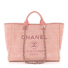 This is an authentic CHANEL Canvas Medium Deauville Tote in Pink. This lovely tote is crafted of pink tweed canvas, with a Chanel advertisement logo on the front. The bag features smooth pink leather top handles, and fabric-threaded polished silver chain link shoulder straps. The top is open to a spacious fabric interior with zipper and patch pockets. Chanel Advertisement, Chanel Canvas, Chanel Tote Bag, Stitch Shop, Pink Tweed, Chanel Tote, Chanel Shoulder Bag, Pink Chanel, Chevron Quilt