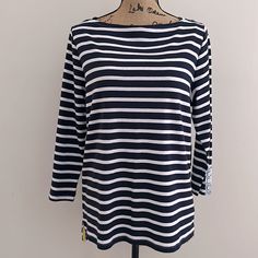 White & Blue Stripe Top With Slits On Side Hem. 3/4 Sleeve With Floral Pattern & 3-Buttons Design On Sleeve Hem. Dash Of Yellow Strips At Hem Slits & Back Neckline. Laying Flat: 20" Pit-Pit, 25"-27" Front & Back Length - High-Low Feature. Boatneck Cut Nautical Long Sleeve Tops For Summer, Fitted White Nautical Tops, Nautical Style Long Sleeve Summer Tops, White Fitted Nautical Tops, Blue T-shirt With Contrast Stripes, Blue Short Sleeve T-shirt With Three Stripes, Blue Summer T-shirt With Horizontal Stripes, Buttons Design, Cheap Blue T-shirt With Contrast Stripes