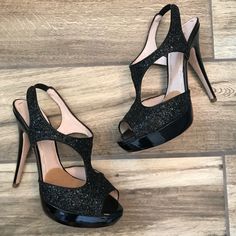 Worn Once! Gorgeous Black Glitter With Patent Leather Heel. Only Sign Of Wear Is On Bottom Sole Of Shoes. Comes In Original Box With Dust Bag For Each Shoe. Size 38 However They Run A Little Small. I Also Have The Small Pads Inserted In Them For Extra Cushioning Under Balls Of Feet! 5.25” Heel 1.25” Platform Miu Miu Shoes, Patent Leather Heels, Black Glitter, Miu Miu, Shoes Women Heels, Patent Leather, Original Box, Shoes Heels, Dust Bag