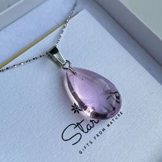 Very delicate and pink drop glass pendant featuring sterling silver 'star' chain 45cm.  Cute and lovely pendant for ladies who love pink hues and elegant jewelry. This pendant in the shape of a water-drop represents a symbol of purity and femininity. Looks very refined on ladies necks and could be the perfect detail of her elegant outfit.  All jewelry comes in premium packaging, gift ready, plus a stylish postcard  All of our jewelry are designed and crafted by hand in our atelier in Bulgaria wi Sterling Silver Crystal Pendant Necklaces For Gifts, Silver Pendant Crystal Necklace For Mother's Day, Silver Crystal Pendant Necklace For Mother's Day, Mother's Day Silver Pendant Crystal Necklace, Sterling Silver Pendant Crystal Necklace For Her, Dainty Silver Crystal Necklaces As Gift, Pink Sterling Silver Crystal Necklace As Gift, Purple Sterling Silver Crystal Necklace Gift, Crystal Round Pendant Necklace As Gift For Her