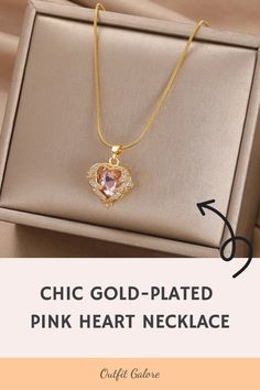 Add a touch of romance to your outfit with our Gold-Plated Pink Heart Necklace. 🌹 Perfect for date night or everyday elegance. 💕 This enchanting pendant is a timeless addition to any jewelry collection. 🌟 Visit OutfitGalore.com to shop now! Feminine Rose Gold Necklace Gift For Her, Chic Rose Gold Charm Necklace For Gift, Chic Jewelry For Wedding And Valentine's Day, Chic Wedding Jewelry For Valentine's Day, Valentine's Day Heart Pendant Clavicle Necklace, Chic Heart Charm Jewelry For Wedding, Pink Open Heart Necklace For Weddings, Elegant Heart-shaped Necklace As A Gift For Her, Elegant Pink Open Heart Necklace