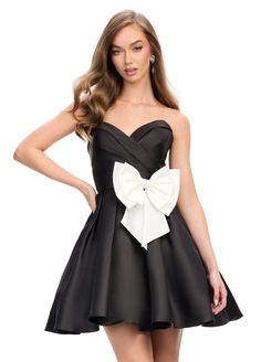 Indulge in luxury with the Ashley Lauren 4783 Cocktail Dress. Featuring a sweetheart neckline and ruched bodice, this dress will enhance your curves. The A-line skirt is made of Mikado fabric and is adorned with a bow at the hip, adding an elegant touch to this sophisticated look. Colors: White, Black (white bow), Red Sizes: 0-16 Elegant Corset Dress With Empire Waist, Elegant Corset Dress With Lined Bodice And Empire Waist, Elegant Fit And Flare Corset Dress With Ruched Bodice, Ruched Sweetheart Neckline Fit And Flare Corset Dress, Strapless Dress With Pleated Sweetheart Bodice, Strapless Sweetheart Neckline Dress With Ruched Bodice For Prom, Strapless Dress With Ruched Bodice And Sweetheart Neckline, Ruched Corset Dress With Sweetheart Neckline For Cocktail, Dress With Ruched Fitted Bodice And Heart-shaped Neckline