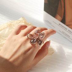 Floral Crystal Ring Rose Gold Metal Rings For Wedding, Rose Gold Flower Ring For Gift, Elegant Handmade Rose Gold Flower Ring, Rose Gold Crystal Flower Jewelry, Rose Gold Crystal Flower-shaped Jewelry, Rose Gold Crystal Jewelry With Flower Shape, Rose Gold Flower Shaped Crystal Wedding Ring, Adjustable Crystal Flower Ring, Rose Gold Open Butterfly Ring For Wedding