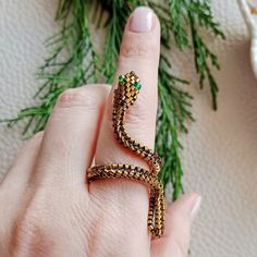 Ring made of gold beads in the shape of a snake. Unusual stylish handmade accessory. good gift. Ring in the shape of a snake talisman for financial success Beaded Snake Ring, Beaded Snake, Lizard Dragon, Snake Ring, Gift Ring, Financial Success, Handmade Accessories, Gold Beads, Stylish Accessories