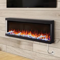 an electric fireplace with bright flames on the side