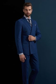 This blue suit for men or women is an amazing addition to any new suit wardrobe and a great enhancement to established suit wardrobes. With the neutral and bold blue color, you will not only be seen as a leader, but you will be able to partner this suit with multiple color options for any season and any situation. This is a piece that everyone should have in their collection. Like this look, but want to make some changes? Chat with a stylist or book an appointment. FREE SHIPPING ON ORDERS OVER $ Elegant Blue Double Breasted Suit For Semi-formal Occasions, Blue Three-piece Suit With Notch Lapel For Business Casual, Tailored Blue Suits With Suit Collar, Fitted Blue Double Breasted Suit For Business Casual, Blue Single-breasted Tuxedo For Workwear, Blue Notch Lapel Tuxedo For Work, Business Blue Single Breasted Tuxedo, Blue Single Breasted Tuxedo, Blue Double-breasted Blazer For Formal Occasions