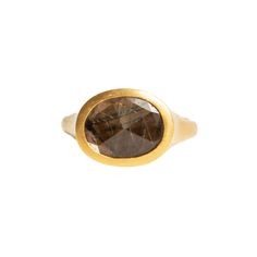 OVAL BROWN SAPPHIRE SET IN 22K GOLD, 7.79 CARAT • DESIGNED AND HAND FORGED IN NEW YORK • SIZE: 7.75 Please email info@elihalili.com or call the studio at 212-941-7979 for any inquiries. Brown Rings, Brown Wedding, Ruby Sapphire, Cross Ring, Ancient Coins, Jewelry Inspo, Emerald Ring, 22k Gold, Hand Forged