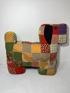 a dog made out of patchwork material