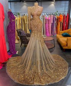 Gold Mermaid Dress For Wedding And Prom Season, Gold Fitted Dress For Prom, Luxury Gold Gown For Prom Season, Luxury Gold Evening Dress For Prom, Glamorous Gold Mermaid Dress For Banquet, Gold Glamorous Mermaid Dress For Banquet, Luxury Gold Gown With Long Sleeves, Gold Mermaid Dress With Sweep Train, Luxury Gold Dress With Sweep Train