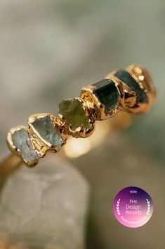 So happy to announce that my Green Ombré Birthstone Ring as the People's Choice Award Winner for #TheEtsies! #danibarbe #gemstonejewelry #crystaljewelry #etsymaker #etsyfinds #theetsies Green Stackable Emerald-cut Jewelry, Stackable Green 14k Gold Jewelry, Green Emerald Cut Jewelry With Gemstone Accents, Green Stackable 14k Gold Jewelry, Green Emerald-cut Gemstone Accent Jewelry, Emerald Cut Green Gemstone Jewelry, Green Gemstone Accents 14k Gold Jewelry, Fine Jewelry Green Stackable Jewelry, Green Birthstone Ring For Spiritual Occasions