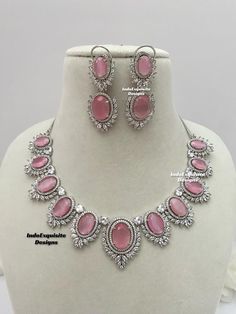 American Diamond Necklace Set / CZ Necklace/Indian Jewelry/ Reception Jewelry/ Bollywood Jewelry/ Silver Pink  All items are shipped from Brampton, Ontario, Canada. If you need your item by a certain day, please reach out to us for express delivery option before placing the order so that we can update the shipping for you. Standard shipping/delivery timeline Below are the delivery timeline estimates. We dispatch all orders by the next business day. ---> USA delivery timeline * 3-6 business days to major urban centers in USA. It may take days extra to remote locations ---> Canada delivery timeline  * 2-3 business days - GTA  & Montreal  * 2-4  business days - Rest of Ontario/Quebec * 3-6 business days-  Rest of Canada    ---> Europe/Middle East timeline * 5-10 business days We kindly reques Sterling Silver Jewelry Sets With Jewels, Silver Fine Jewelry Necklace With Jewels, Silver Necklaces With Jewels In Fine Jewelry Style, Fine Jewelry Silver Jewelry Sets With Stone Setting, Silver Jeweled Necklaces In Fine Jewelry Style, Exquisite Silver Jewelry With Stone Setting, Fine Jewelry Silver Jewelry Sets With Jewels, Silver Fine Jewelry Sets With Jewels, Wedding Sterling Silver Jewelry With Stones