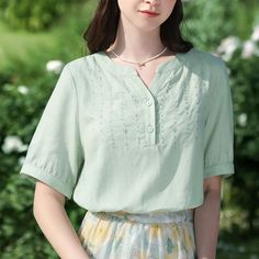 Introducing Our French Unique V-neck Women's Blouse Step into elegance and sophistication with our French Unique V-neck Women's Blouse, a stunning addition to your summer wardrobe. Crafted with meticulous attention to detail and adorned with exquisite Chinese embroidery, this blouse seamlessly blends timeless style with contemporary charm. This blouse is tailored for the modern woman who exudes confidence and grace in every step she takes. Made from a luxurious blend of linen and viscose, it offers a perfect balance of comfort and breathability, making it ideal for the warm summer months. Product Features: Fabric Type: Llax Pattern Type: Geometric Fit Type: Regular Fit Style: Office Lady Season: Summer Material: Linen, Viscose Elasticity: Non-Stretch Decoration: Exquisite Chinese Embroider Solid Bohemian V-neck Blouse, Summer V-neck Blouse With Floral Embroidery, Elegant V-neck Blouse For Summer, Bohemian V-neck Solid Color Blouse, V-neck Cotton Blouse, Summer Cotton V-neck Top, Floral Embroidered V-neck Blouse For Vacation, Solid Color Short Sleeve V-neck Top For Spring, Cotton V-neck Blouse