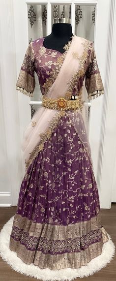 Elegant Tissue Half saree in elegant deep purple color with vibrant Dupatta with work. size :38 height:41 in Purple Chanderi Anarkali Set For Reception, Purple Silk Sharara For Navratri, Purple Chanderi Sharara For Reception, Festive Purple Silk Pre-draped Saree, Purple Anarkali Set With Traditional Drape, Elegant Purple Tissue Silk Pre-draped Saree, Purple Pre-draped Saree For Wedding And Eid, Elegant Purple Pre-draped Saree, Purple Tissue Silk Pre-draped Saree With Sheer Dupatta