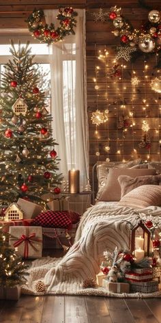 a bedroom decorated for christmas with lights and presents on the floor next to a bed