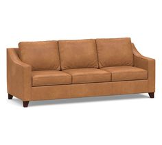 a brown leather couch with three pillows on the back and one arm folded up in front