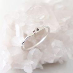 The Wave Initial Ring Our slim 1.3 mm band is hand formed, soldered, hammered and stamped with your tiny initial or monogram (up to 3 characters). Wear one, or stack them for all your loves. ♥ This listing is for one ring; add multiple quantities to your cart for more. {DETAILS}: * 1.3 mm band (2 mm where initial sits) * 1.5 mm initial * your choice of sterling silver, 14k gold fill, rose gold fill or solid 14k gold! ►Lots more stacking rings for...stacking! http://etsy.me/1U0RlXp ►Silver heart Dainty Stackable Rings With Initials For Promise, Minimalist Hand Stamped Initial Ring As Gift, Minimalist Sterling Silver Stackable Rings With Initials, Sterling Silver Initial Ring For Everyday, Simple Sterling Silver Stackable Initial Ring, Dainty Sterling Silver Stackable Rings With Initials, Adjustable Hand Stamped Initial Ring Minimalist, Minimalist Hand Stamped Stackable Promise Rings, Adjustable Hand Stamped Minimalist Initial Ring