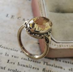 Beautiful 1950s vintage silver citrine ring, US Size 6 3/4, in good vintage condition. Box on the photos not included! Diameter: approx. 17 mm (0.7 inch) Material: 925 silver (gold plated), citrine total weight: 3.9 g US Size: approx. 6 3/4 (EU size 54) A stunning religious shop well worth a visit ... https://etsy.me/2NNNK4g Vintage 14k Stamped Sapphire Ring For Formal Occasions, Gold Solitaire Amethyst Ring For Formal Occasions, Collectible Heirloom Solitaire Ring, Heirloom Solitaire Topaz Ring For Formal Occasions, Antique 14k Gold Solitaire Jewelry, Antique Emerald Ring In Stamped 14k Yellow Gold, Victorian Emerald Ring In Yellow Gold Stamped 14k, Vintage Solitaire Signet Ring, Victorian Emerald Ring In 14k Yellow Gold