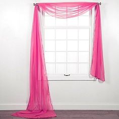 a window with pink sheer curtains and the words holiday joy is happening on ebay