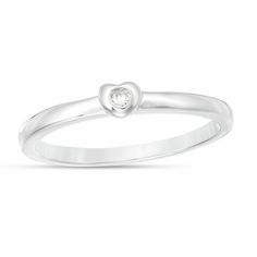 Sleek and unique, this sparkling solitaire promise ring is a look of love. Crafted in sterling silver, this shimmering design features a single bezel-set diamond accent inside sculpted heart frame. Buffed to a brilliant luster, this comfort-fit promise ring seals your commitment. Custom-made to fit her ring size. Sterling silver rings cannot be resized after purchase. Valentine's Day Single Diamond Promise Ring, Anniversary Rings With Single Diamond For Valentine's Day, Heart-shaped Bezel Setting Ring For Anniversary, Valentine's Day Anniversary Ring With Single Diamond, White Gold Heart Ring With Single Diamond For Promise, Heart Ring With Bezel Setting For Promise, Heart-shaped Single Diamond Jewelry For Promise, Heart-shaped Single Diamond Promise Ring, White Gold Solitaire Heart Ring For Anniversary