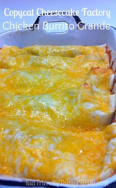 a cheesy chicken burrito in a casserole dish with text overlay