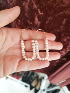 ∙These pearl hoop earrings are super femme and perfect for dressing up a simple outfit! Would also be wonderful for a bride with a bit of vintage flair. ∙Unique shape is sure to catch you some compliments. ∙Nice and lightweight on the ear! ∙Top quality materials are excellent for sensitive ears/skin. ∙These measure ~2.25 inches long. ~M A T E R I A L S ~ Choose from- * 925 Sterling silver *14k Gold fill *14k Rose gold fill **What is 14k Gold-fill?** Gold fill does not tarnish or wear off and con White Pearl Embellished Hoop Earrings For Wedding, Pearl Embellished Hoop Earrings For Wedding, Feminine Pearl Chain Earrings, Chic Pearl Embellished Earrings For Wedding, Pearl Chain Hoop Earrings For Wedding, Small Hoop Pearl Chain Wedding Jewelry, Elegant Hoop Chandelier Earrings, Feminine Pearl Chain Earrings For Wedding, Chic Pearl Drop Chandelier Earrings For Weddings