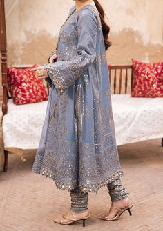 Introducing our New collection 'CHIKANKARI EID '24' by Asim Jofa designed to make you look and feel your best. Envelop yourself in the enchanting hues of bluish grey with this kalidar outfit, a masterpiece from Asim Jofa's "Chikankari" Eid collection. The embroidered details like whispered secrets adorn every inch with grace and elegance. The two-toned mink color zari and gold sequins sparkle adding a celestial aura to the traditional silhouette. With motifs on the dupatta reminiscent of timeless tales, this outfit is a blend of nostalgia and modern allure. Embroidered Center Panel For Back On Paper Cotton. Embroidered Jaal Kali For Front, and Back On Paper Cotton. Embroidered Boti Kali For Front, and Back On Paper Cotton. Embroidered Ghera Border For Front On Paper Cotton. Embroidered Sle Organza Kurti, Batik Print Dress, Dupion Silk Saree, Indian Anarkali, Anarkali Lehenga, Pakistani Designer Clothes, Lehenga Suit, Asim Jofa, Silk Kurti