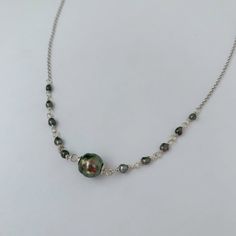 "Looking for something unique and different? This beautiful necklace displays a nice and small Tahitian Pearl paired with small and dainty tahitian keshis pearls . ✨This Listing is for Sterling Silver. For the Gold-filled necklace is click on the following link: Length : 17-18\" if you need a different size please specify at checkout . There is an extender on the back to make it more versatile and can be adjusted slightly about 1\" . Description ✨Tahitian pearls: Size : 8-9mm small and dainty si Artisan Necklace With Pearl Charm As Gift, High Luster Tahitian Pearl Necklace, Briolette High Luster Pearl Necklace Gift, Artisan Pearl Necklace Gift, High Luster Briolette Pearl Necklace As Gift, High Luster Briolette Pearl Necklace For Gift, Handmade Pearl Necklace With Briolette Shape, Unique Pearl Necklace Chain As Gift, Unique Pearl Chain Necklace For Gift