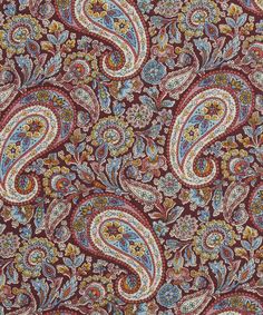 a red and blue paisley print fabric