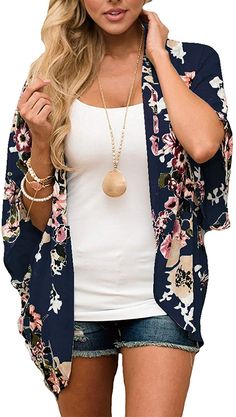 Kimonos are the perfect summer layering piece. Wear over a favorite tank as a cardigan or take to the beach as a swimsuit cove rup. It's an incredibly versatile piece in your wardrobe. It comes in bright floral patterns as well as leopard.. Lightweight, airy material Great for layering Bright spring/summer patterns Casual V-neck Cardigan For Vacation, Spring Summer V-neck Cardigan, Lightweight Open Front Casual Cover-up, Blue Open Front Cover-up For Vacation, Casual Stretch Cover-up For Vacation, Trendy Summer Beach Cardigan, Trendy Blue Spring Cardigan, Blue V-neck Cardigan For Vacation, Summer Floral Print Casual Cardigan