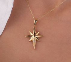 Our north star pendant necklaces are made of 14k solid gold. They are absolutely unique styles that everyone loves them!  One of our gold pole star charm (Style - With Stone) is decorated with zircon stones that look charming, the other is made of solid gold also however it has not zircon stones on it (Style - Without Stone). Both of these starburst necklaces will accompany you every day and everywhere with their dainty style.  If we talk about their features: - Style/Without Stone: The height of the pendant is 29.35 mm. The width of the pendant is 19.02 mm. The tickness of the pendant is approx. 3.14 mm -Style/With Stone: The height of the pendant is approx. 33 mm. The width of the pendant is 20 mm. When you consider our gold north star necklaces as a gift, they will make your loved ones Star Necklace Aesthetic, Star Necklaces, North Star Pendant, Gold Star Necklace, Stars Necklace, North Star Necklace, Starburst Necklace, Dainty Style, Star Necklace Gold