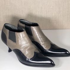 Miu Miu Spectator Bootie Sz 36. Soft Leather Upper With Some Creasing On Both Boots. Contrasting Black Leather Looks New. Leather Soles Show Normal Wear. Heels Are In Great Shape With Minimal Scratches. Sister Company To Prada. Heels Are Approximately 2.5”. Color Is Black & Taupe. Low Heel Leather Sole Heeled Boots For Office, Office Heeled Boots With Leather Sole And Low Heel, Office Low Heel Boots With Leather Sole, Office Low Heeled Boots With Leather Sole, Black Chelsea Boots With Sculpted Heel, Pointed Toe Booties For Office In Medium Width, Formal Low Heel Booties With Reinforced Heel, Black Heels With Contrasting Heel Counter, Black Heels With Contrasting Low Heel