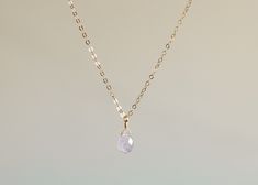 The loveliest gentle purple cape amethyst is featured on a necklace of sparkling chain, in your choice of sterling silver or 14k gold filled. This delicately hued drop is ethereally beautiful and will not disappoint. The cape amethyst necklace arrives gift ready. Necklace details + 14mm cape amethyst faceted drop + Fine 1.3mm cable chain + Spring clasp closure Delicate Adjustable Teardrop Jewelry, Delicate Adjustable Pendant Jewelry, Minimalist Gemstone Dangle Jewelry, Sterling Silver Birthstone Necklace With Delicate Chain, Teardrop Gemstone 14k Gold Jewelry, Elegant Amethyst Birthstone Necklace, 14k Gold Filled Gemstone Pendant Jewelry, Delicate 14k Gold Teardrop Jewelry, Delicate Yellow Gold Crystal Necklace Gift