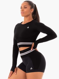 ABOUT THE COLLECTION No one does Seamless like Ryderwear. This collection was created for optimal movement to support you throughout your epic workouts. Each fully functional piece is seamlessly breathable to keep you cool, flatters your figure and offers unparalleled comfort. Discover luxury without limits, no matter how you move. The Freestyle Long Sleeve Crop delivers a weightless, unrestricted feel, with a super flexible seamless knit fabric providing freedom of movement so you can crush you Black Compressive Seamless Top, Functional Seamless Black Tops, Black Technical Activewear Athletic Fit, Dynamic Black Activewear For Gym, Seamless Athletic Fit Activewear For Training, Black High Stretch Seamless Sports Bra, Black Seamless Tops For Pilates, Seamless Black Tops For Pilates, Technical Seamless Activewear For Training