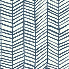 a blue and white wallpaper with wavy lines