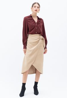 Put an elegant look by wearing this unique collection from Chicwish. Featuring asymmetric hemline and flap design and made to accentuate your body type, this skirt will surely give you that extra oomph and make you stand out wherever you go wearing this.    - High waist  - Flap front with O-ring at waist  - Asymmetric hem  - Concealed back zip closure  - Lined  - 100% Polyester  - Hand wash cold            Size  Length  Waist  Hip      XS  cm  60-78  66  90      inch  23.5-30.5  26  35.5      S Chic Asymmetrical Draped Skirt, Elegant Draped Skirt With Asymmetrical Hem, Elegant Fitted Asymmetrical Skirt, Elegant Fitted Bottoms With Asymmetrical Hem, Elegant Bottoms With Asymmetrical Hem, Elegant Bottoms With Asymmetrical Hem For Formal Events, Elegant Formal Bottoms With Asymmetrical Hem, Elegant Asymmetrical Wrap Skirt For Party, Elegant Asymmetrical Party Wrap Skirt